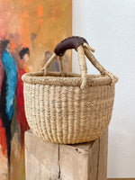 Hunu small woven market or storage basket - natural and brown leather handles